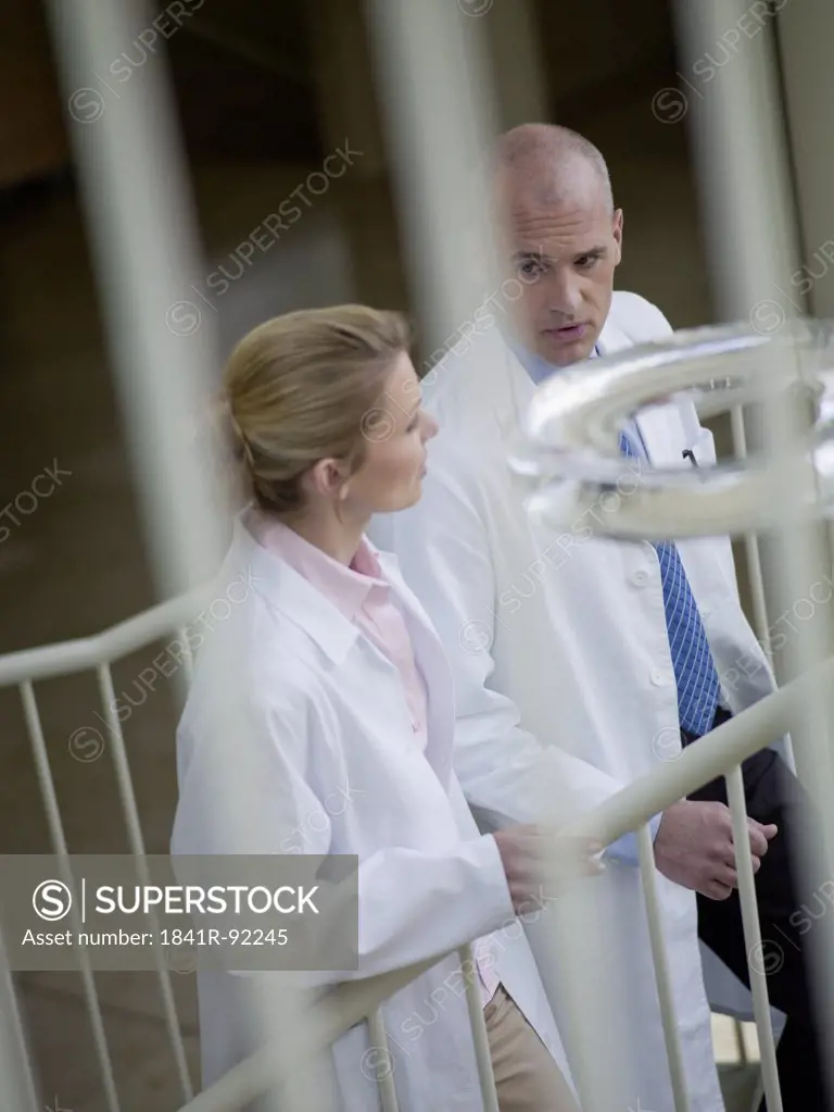 Doctors moving up on staircase