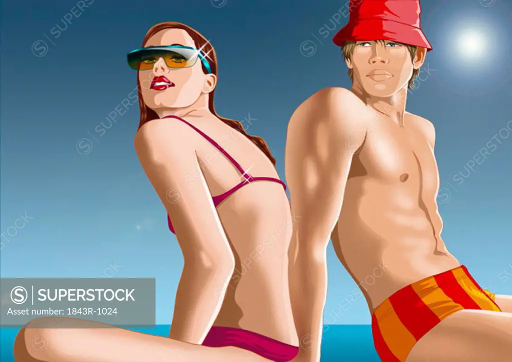 Young couple in swim suits in the sun