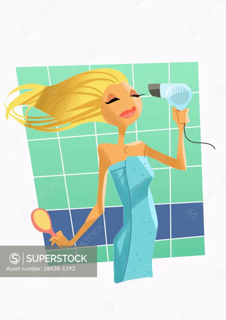Blonde woman drying hair in bathroom
