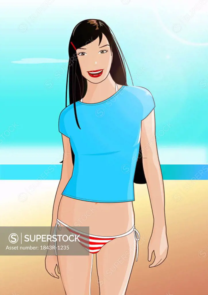 Young woman on beach with T-shirt and bikini bottoms