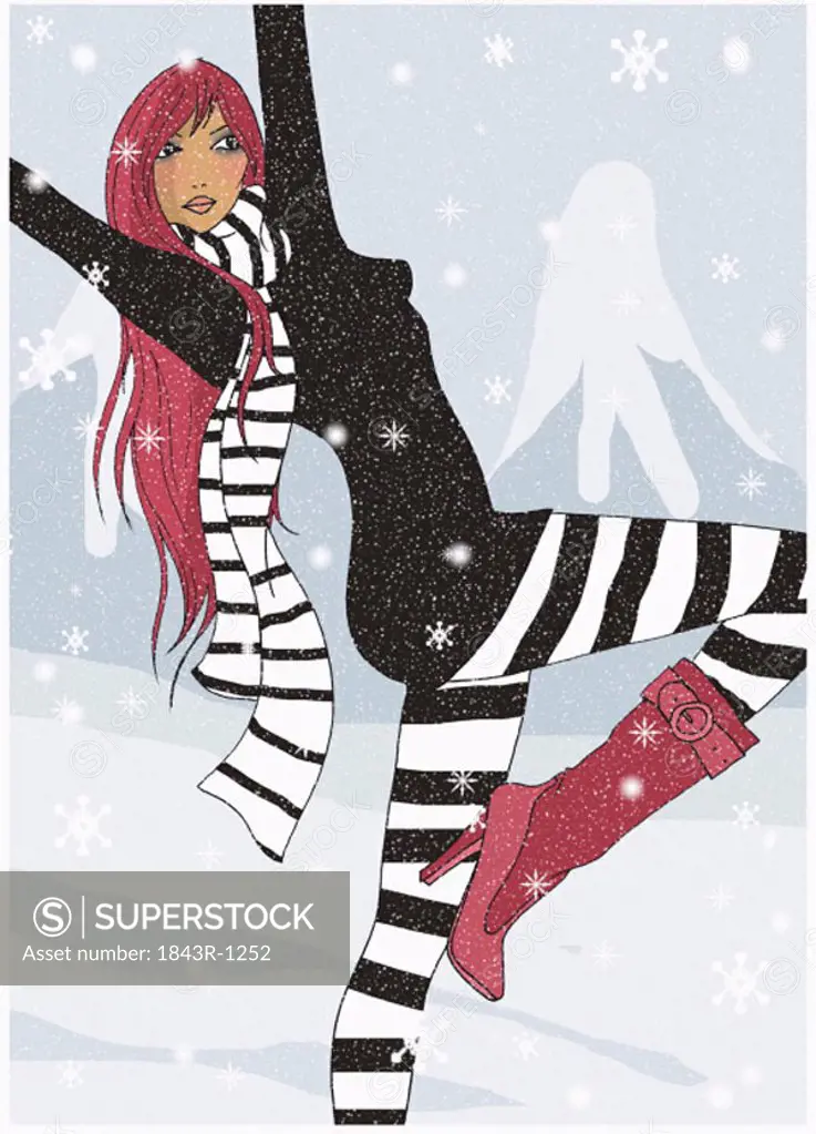 Young woman dancing in the snow