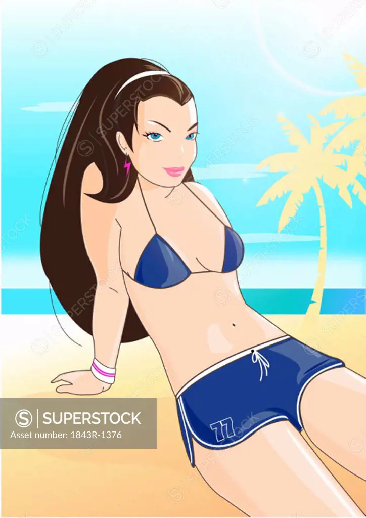 Woman on beach with bikini top and shorts