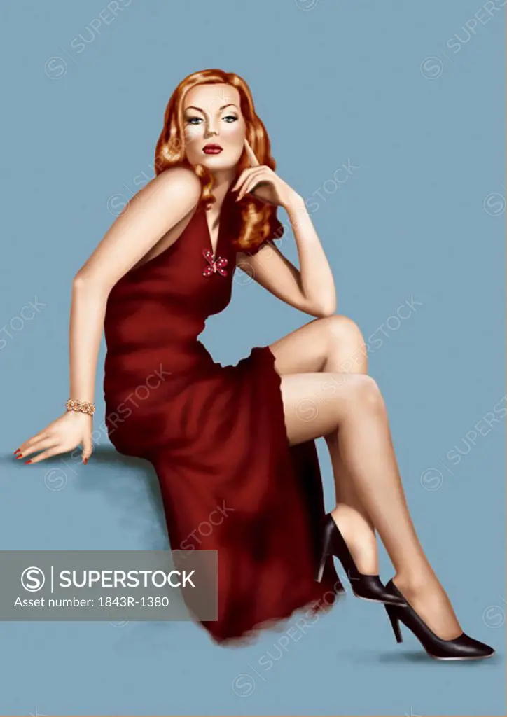 Pinup girl posing in red gown and black heels