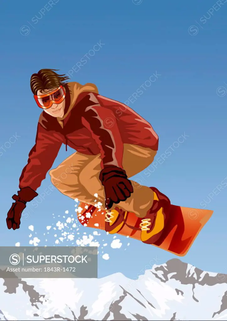 Young man on his snowboard in the air