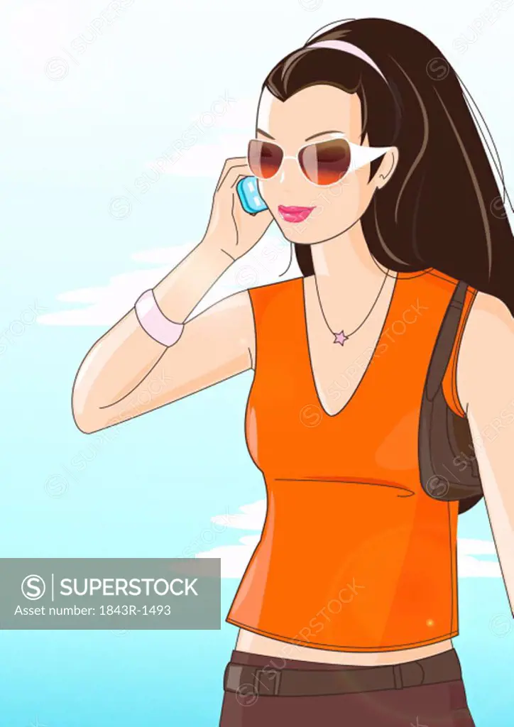 Casual woman with sunglasses talking on mobile phone