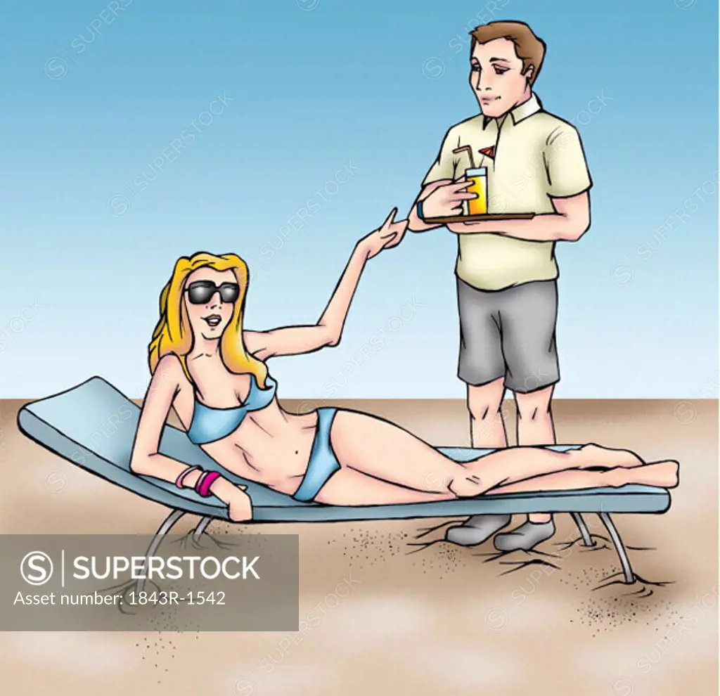 Man serving woman with a drink on the beach