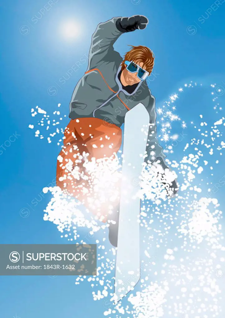 Young man ski jumping on his snowboard
