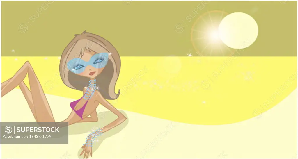 Woman with shades, bikini, and jewelry lying on the beach