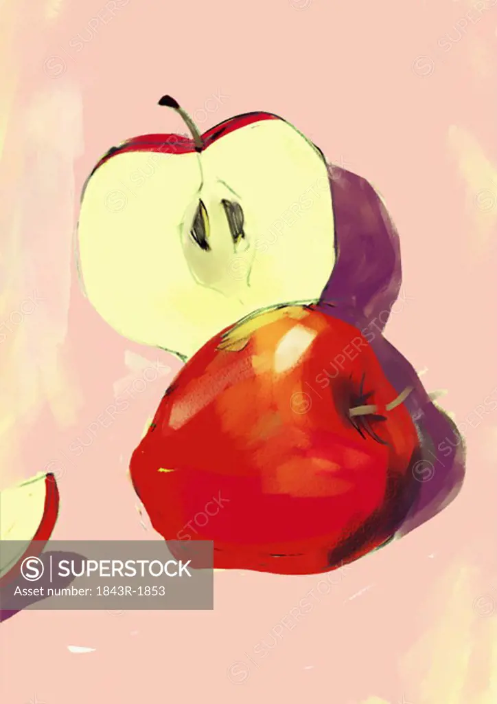 A whole apple next to a cut apple half