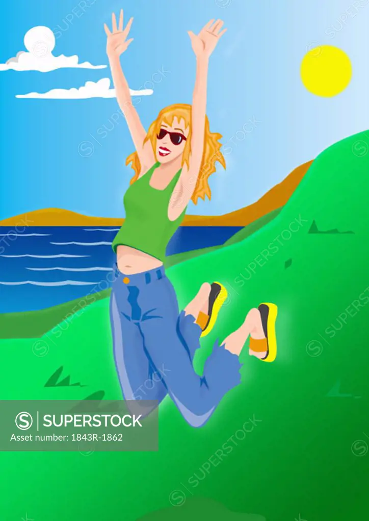 Young woman jumping in the air by the seaside