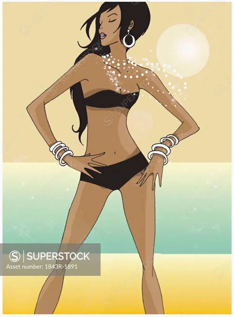 Woman on beach with bikini and jewelry