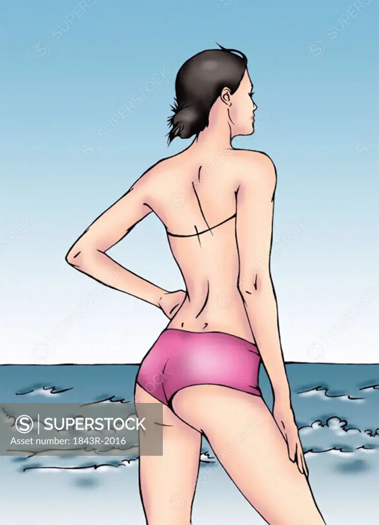 Back side of woman on beach