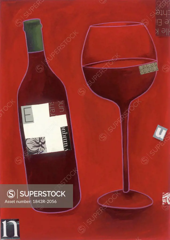 A bottle of red wine with a wineglass half full