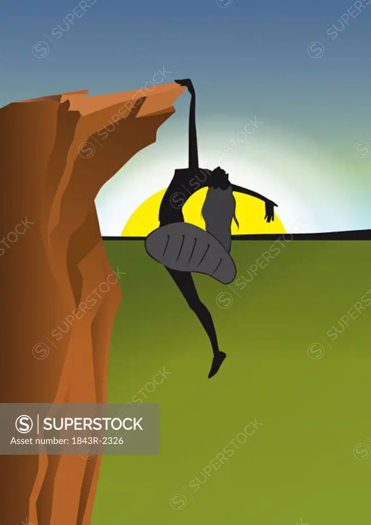 Female rockclimber holding onto cliff with one hand