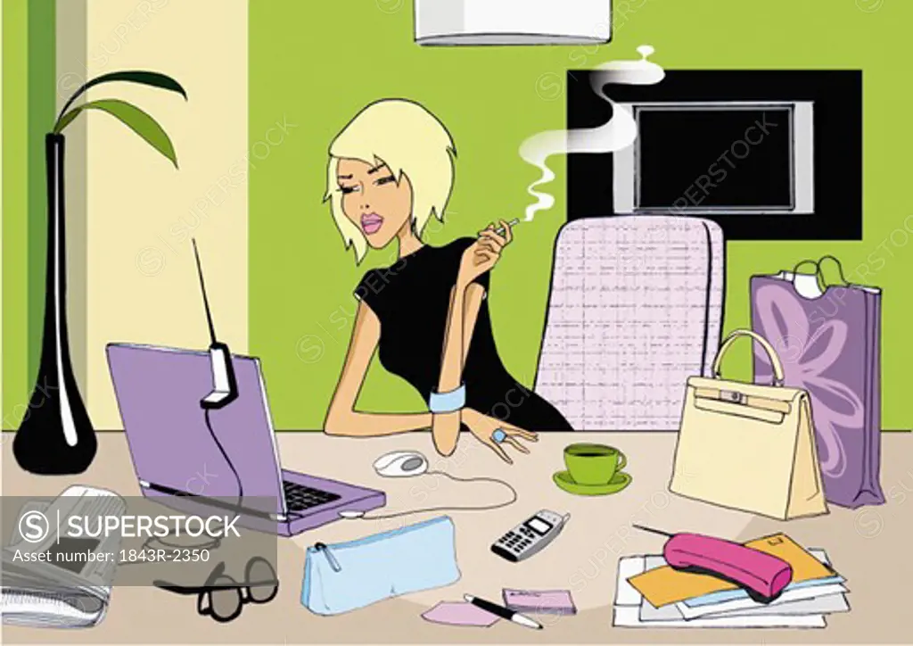 Modern businesswoman at computer with a cigarette