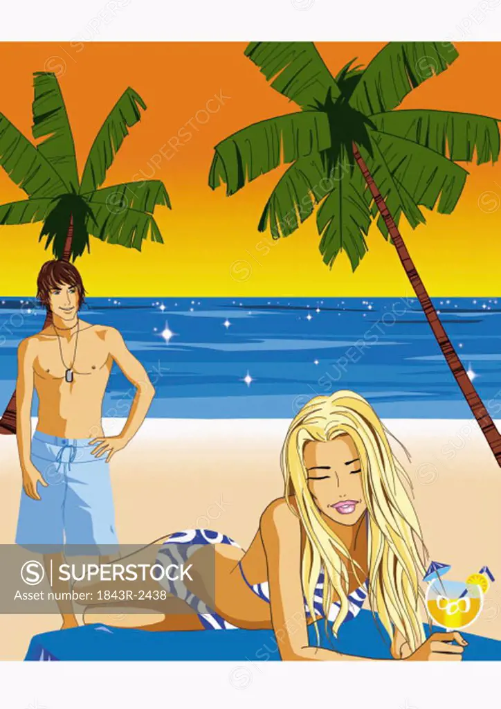 Man looking at woman lying on the beach with a drink