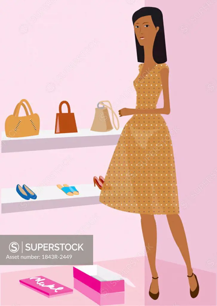 Woman trying on shoes in a shoe and bag store