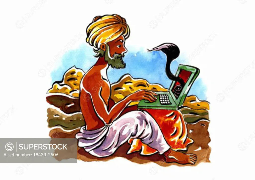 Indian snake-charmer with a turban on his laptop