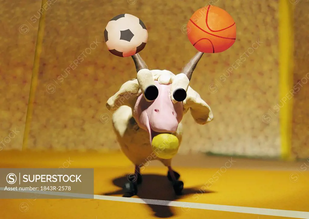 Capricorn: goat playing with balls