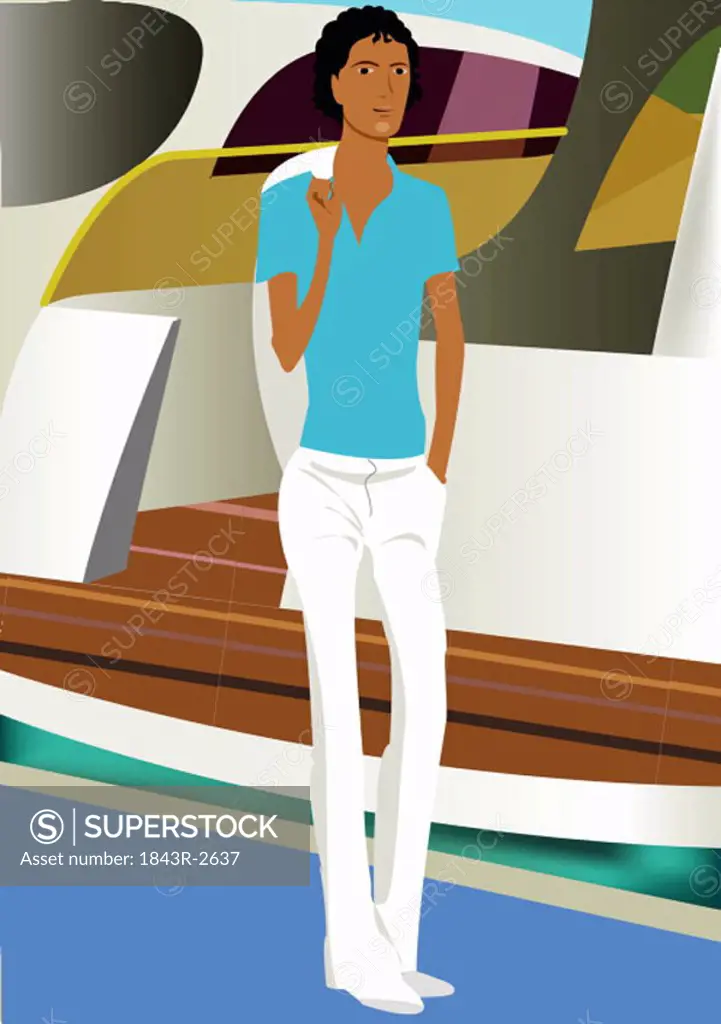 Young dark-skinned male strolling on the deck of a boat