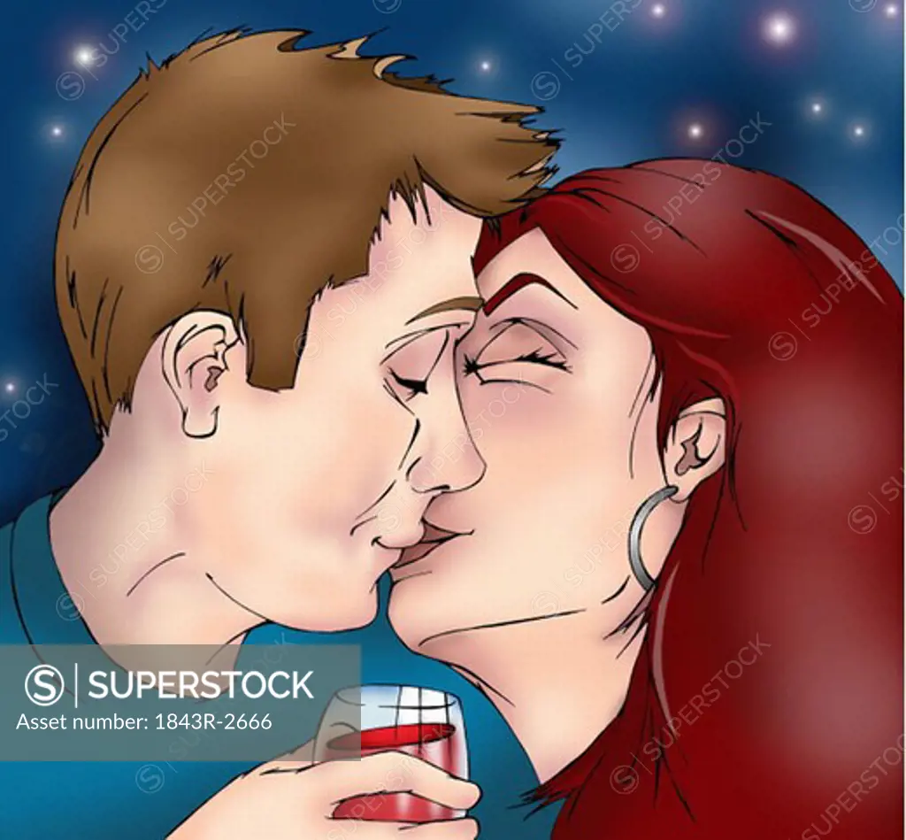 Closeup of couple kissing in celebration