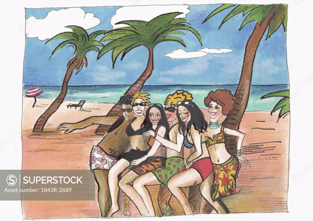Group of women with a man posing on a tropical beach