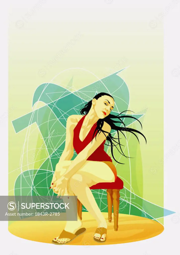 Woman with wild hair sitting in front of an abstract pattern