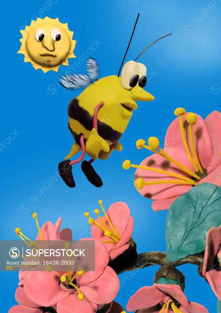 Bee buzzing around flowers