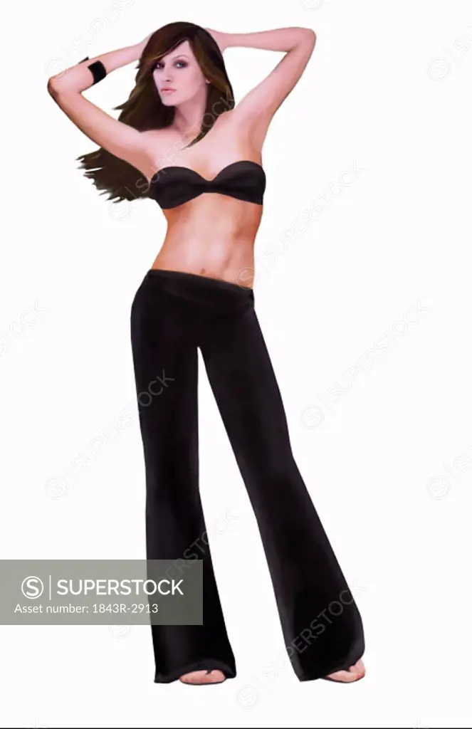 Woman posing in pants and bikini top