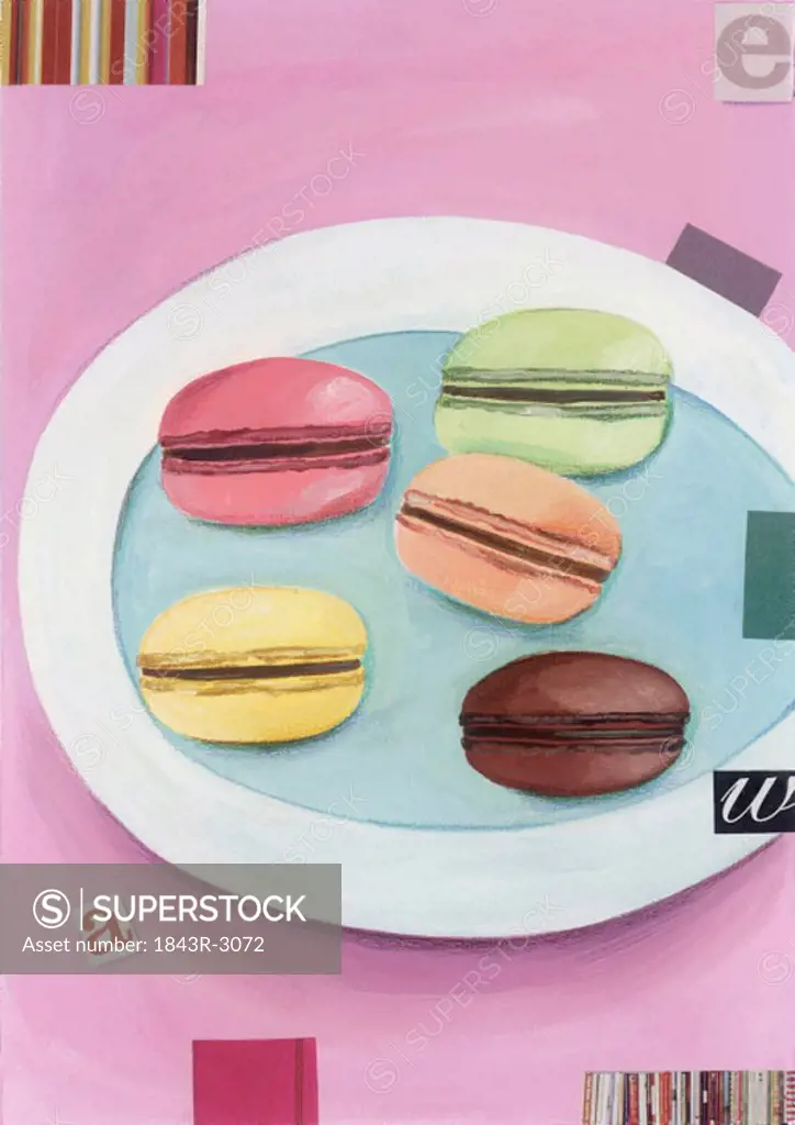 Five colored macaroons on a dish