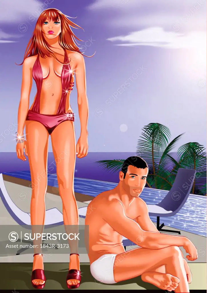 Young couple on beach in swim suits