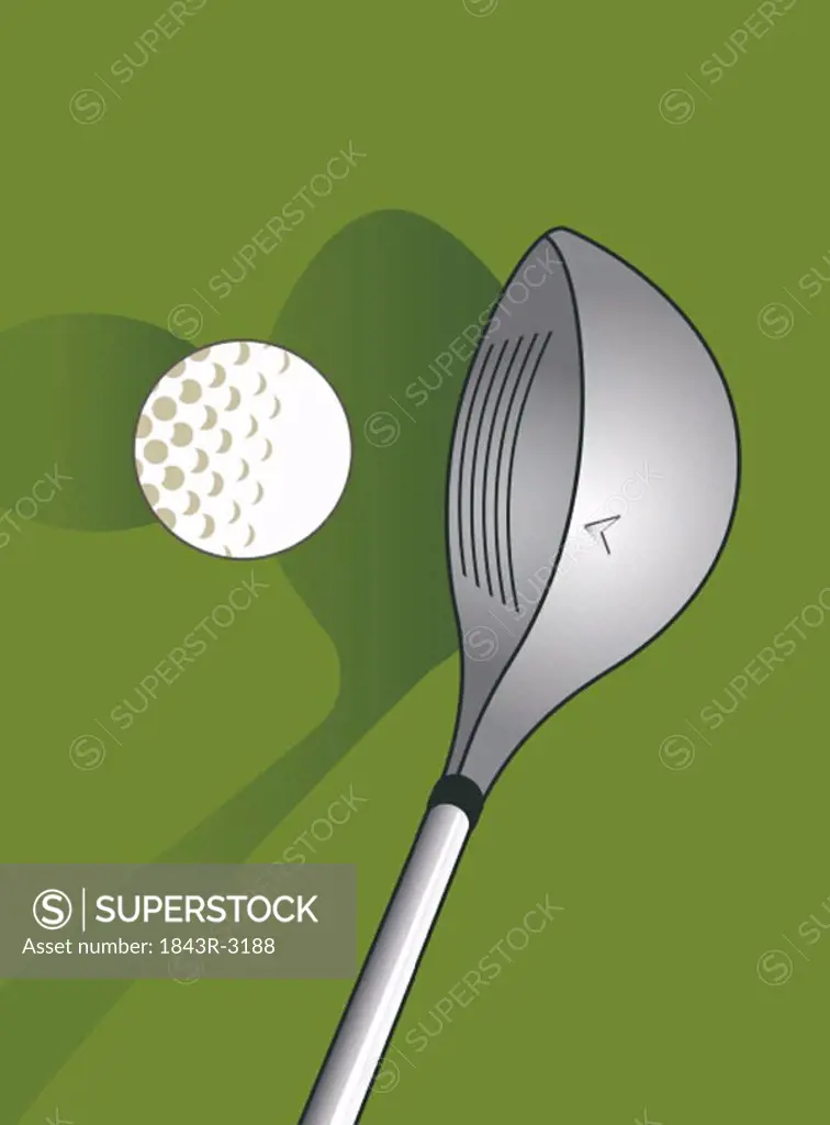 Closeup of a golfball and gold tee