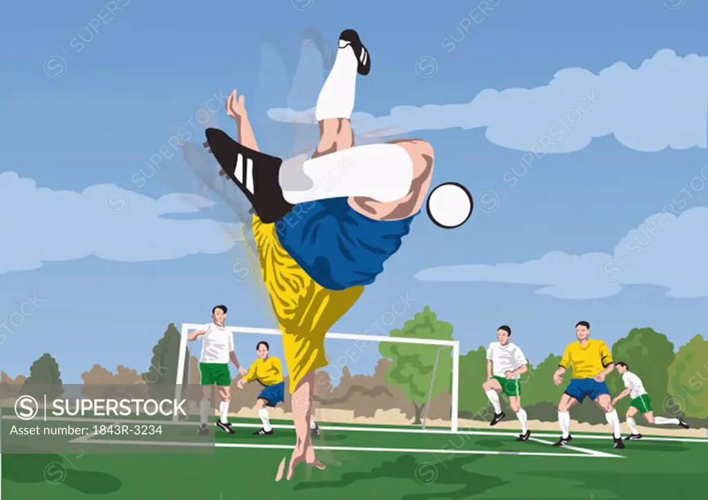 Soccer player diving for the ball