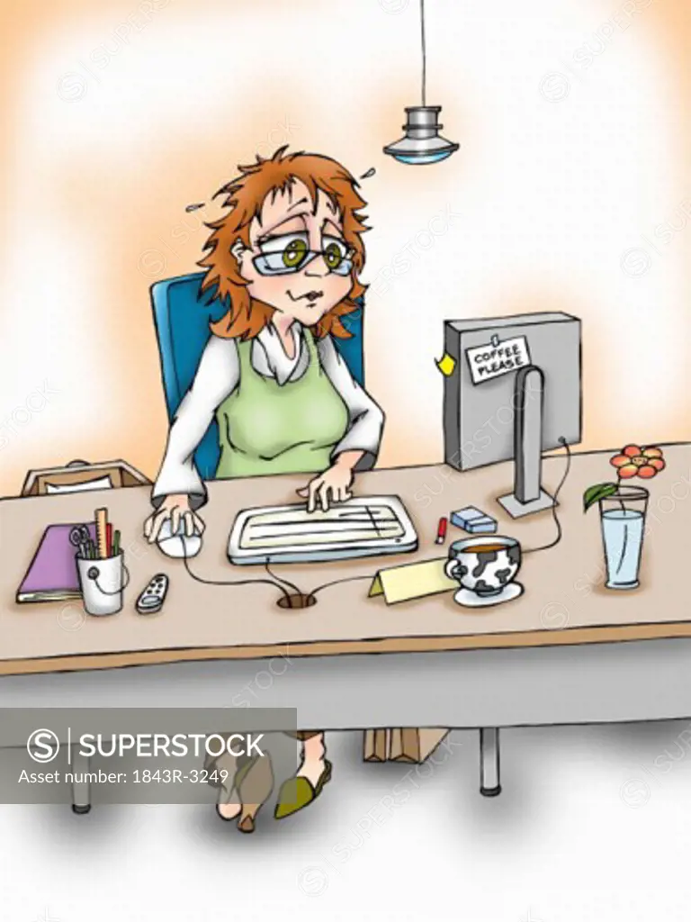 Woman at computer at her desk