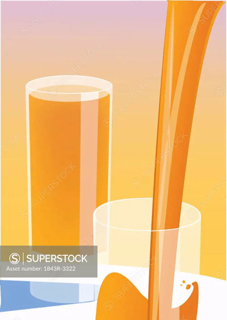 Pouring orange juice in a glass