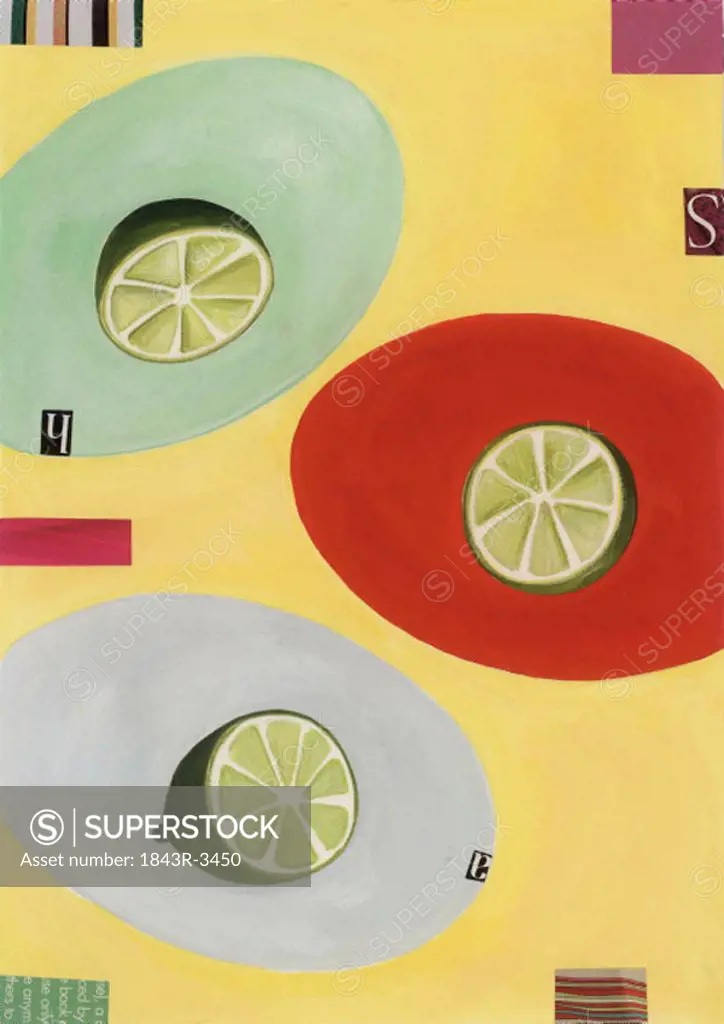 Three cut lime halves on colored circles