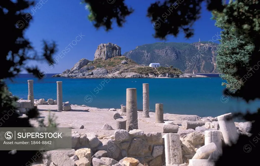 Kefalos bay, view of Kastri, small island, and Agios Stefanos Church, ruins of Astypalaia  Kos, Dodecanese, Greece