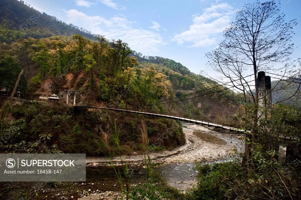 Suspension bridge over a river, Darjeeling, West Bengal, India
