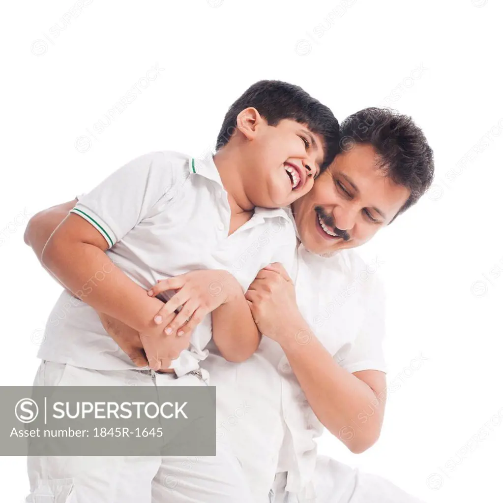 Man playing with his son
