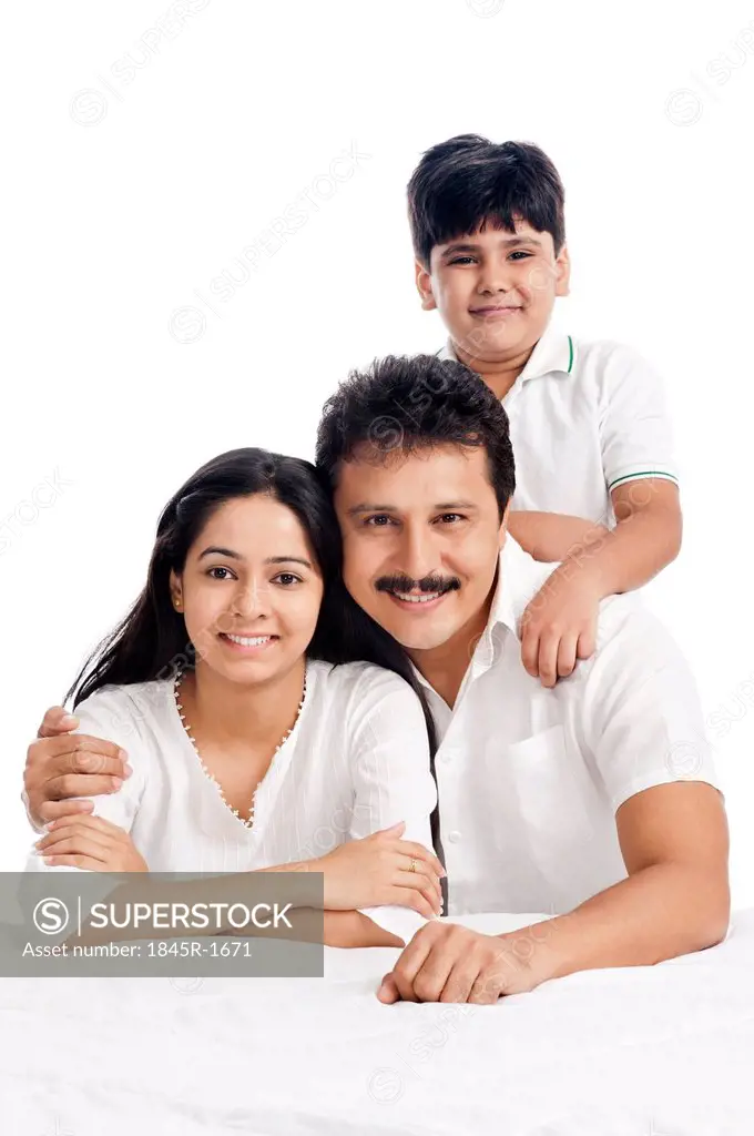 Portrait of a smiling boy with his parents