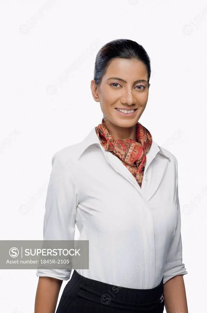 Close-up of an air hostess smiling