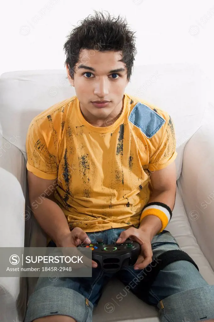 Portrait of a man playing a video game