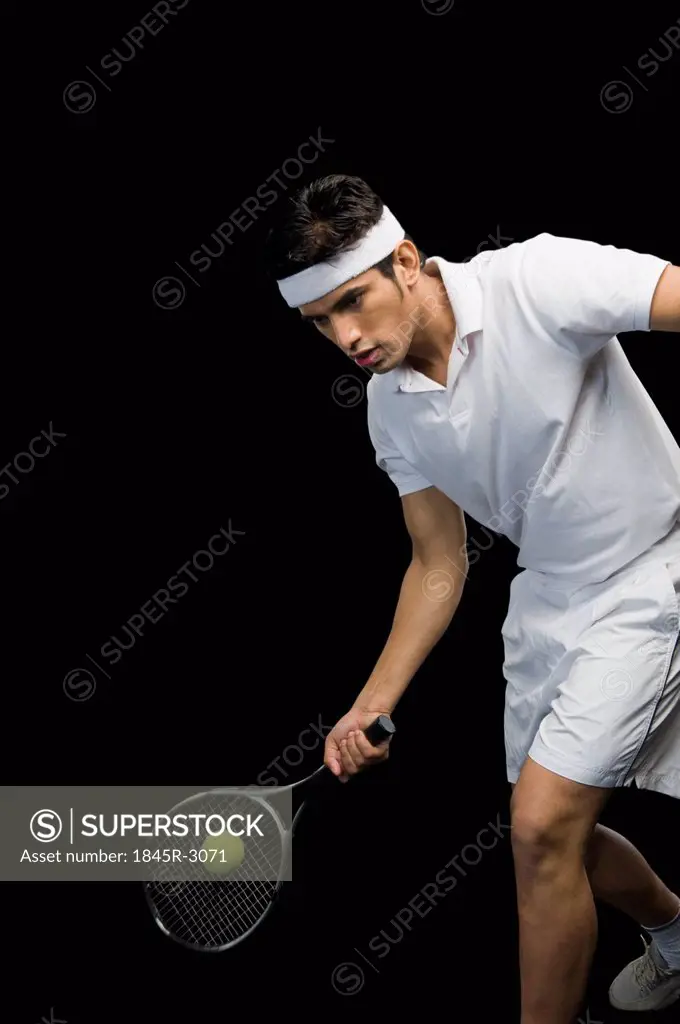 Tennis player playing a shot