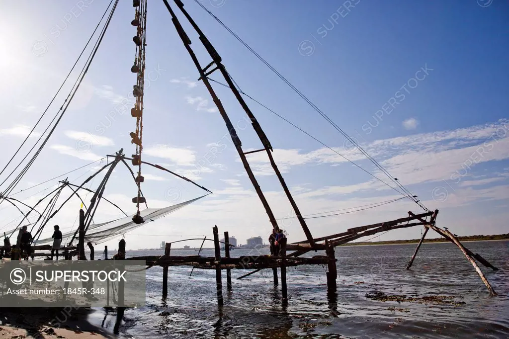 Chinese fishing nets at a harbor, Cochin, Kerala, India