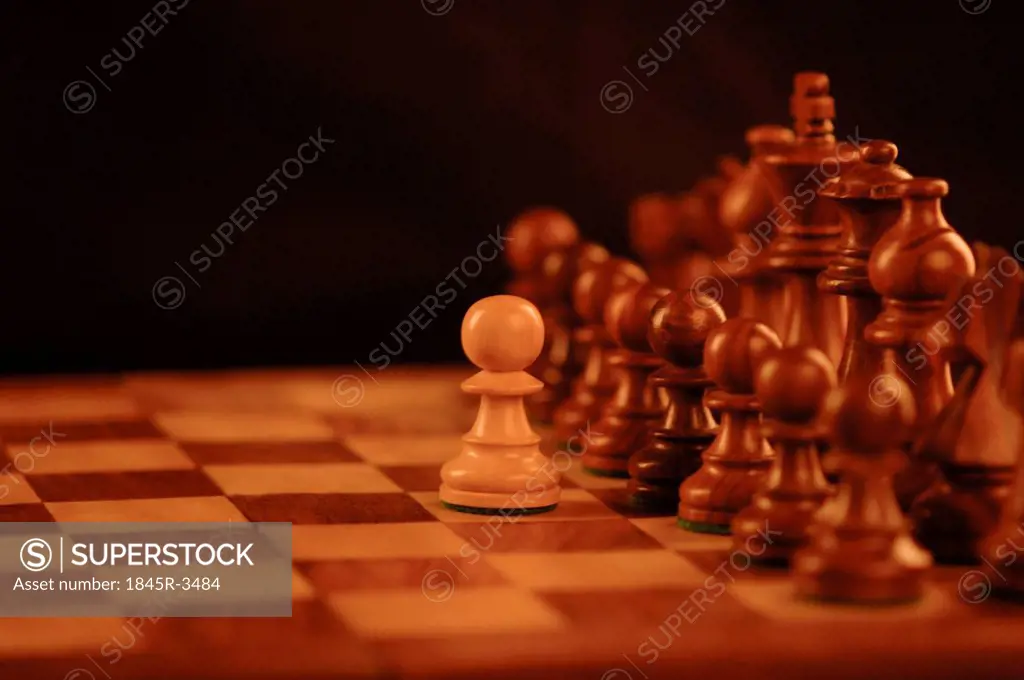 Close-up of chess pieces on a chessboard