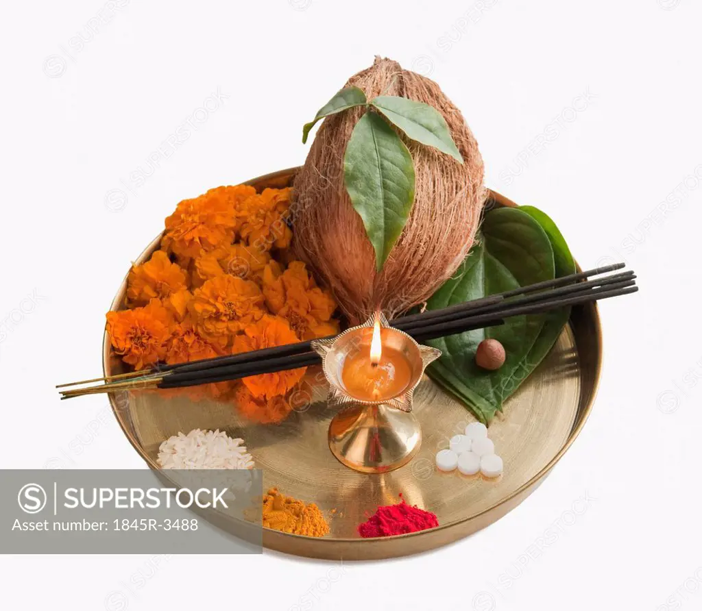 Close-up of religious offerings in a thali