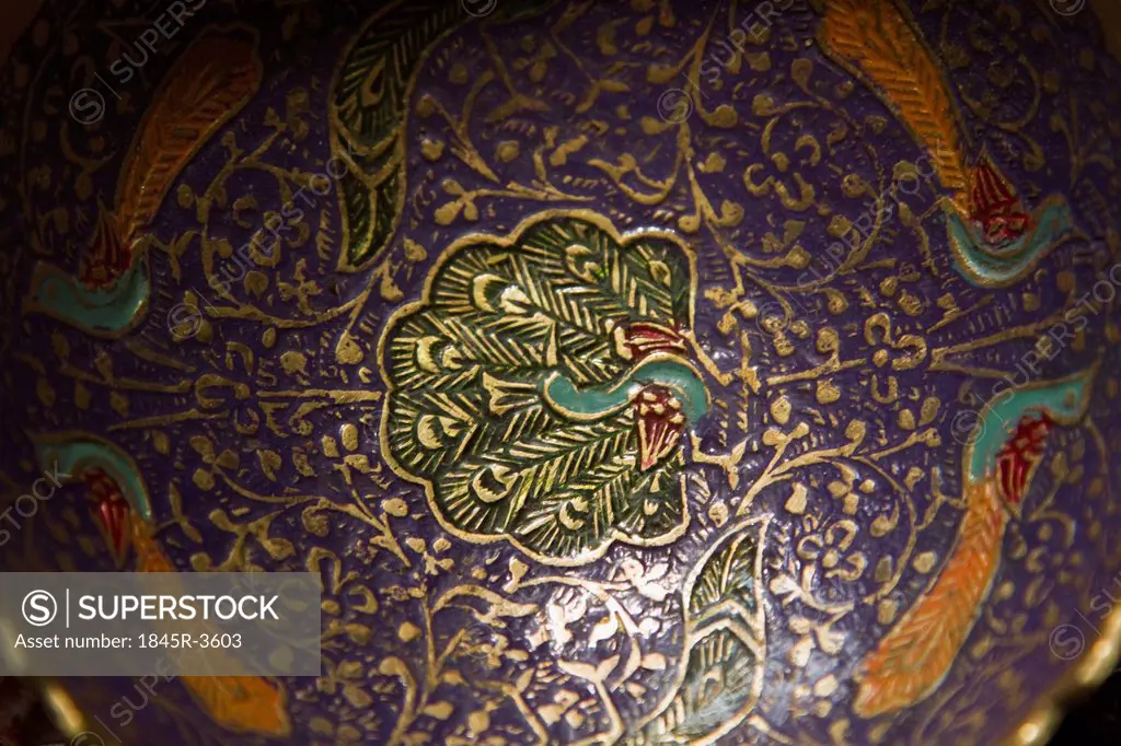 Close-up of a painting on a metal bowl, Gwalior, Madhya Pradesh, India