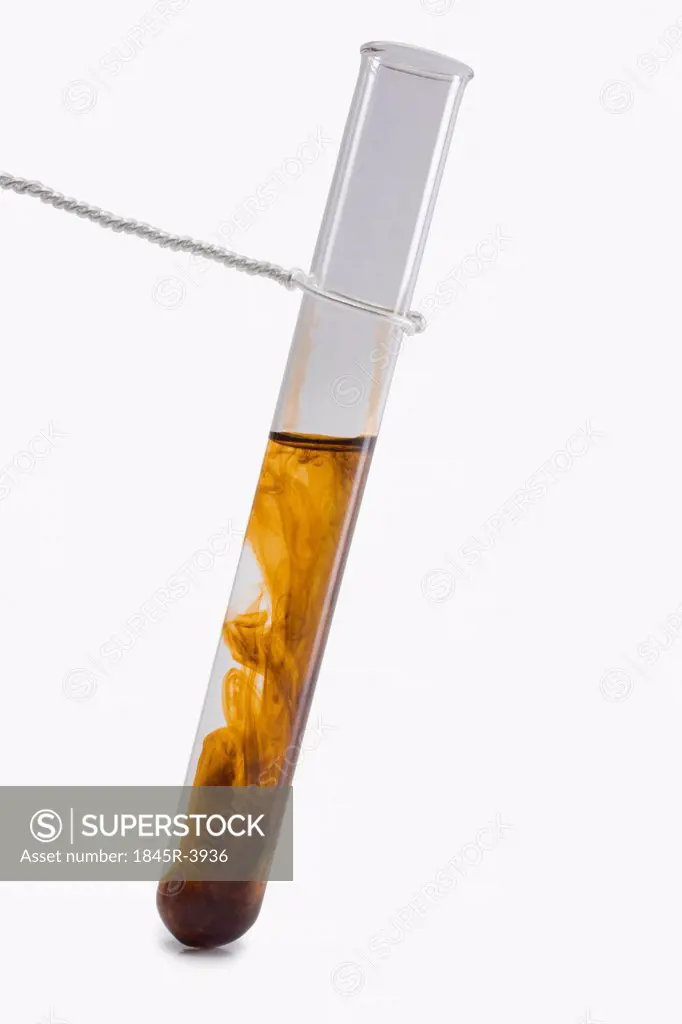 Close-up of chemicals being mixed in a test tube