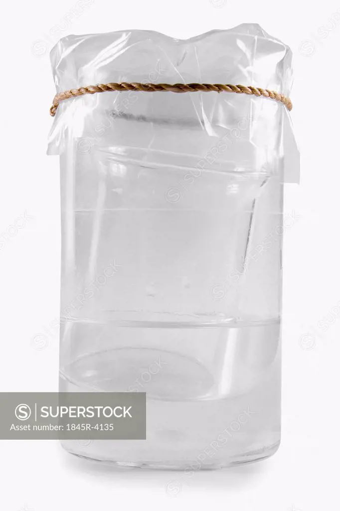 Close-up of a beaker inside a jug