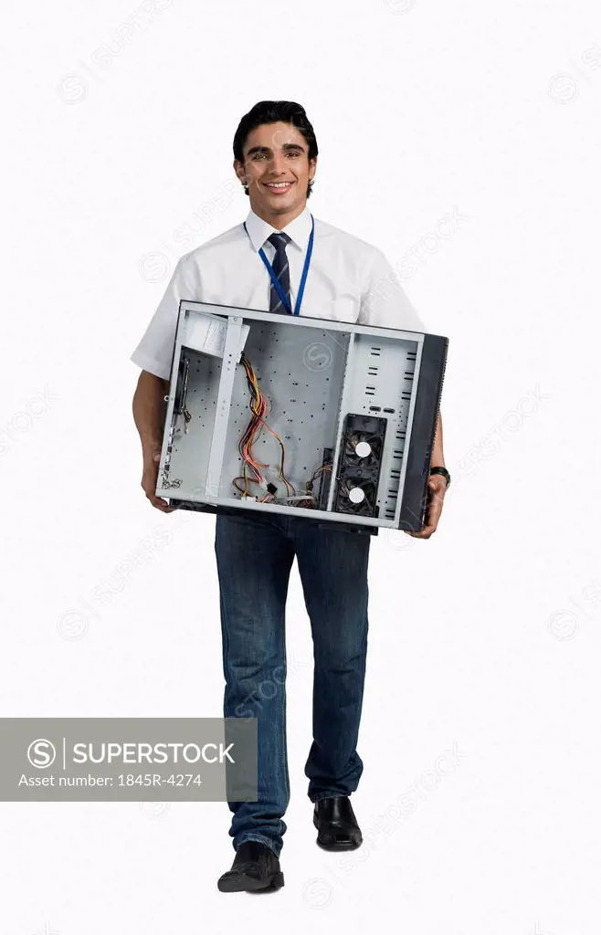 Engineering student carrying a computer cabinet